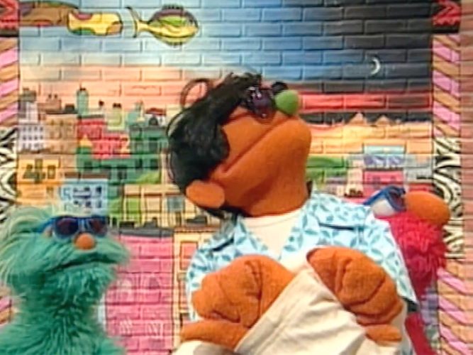 Rosita and Elmo rapping.