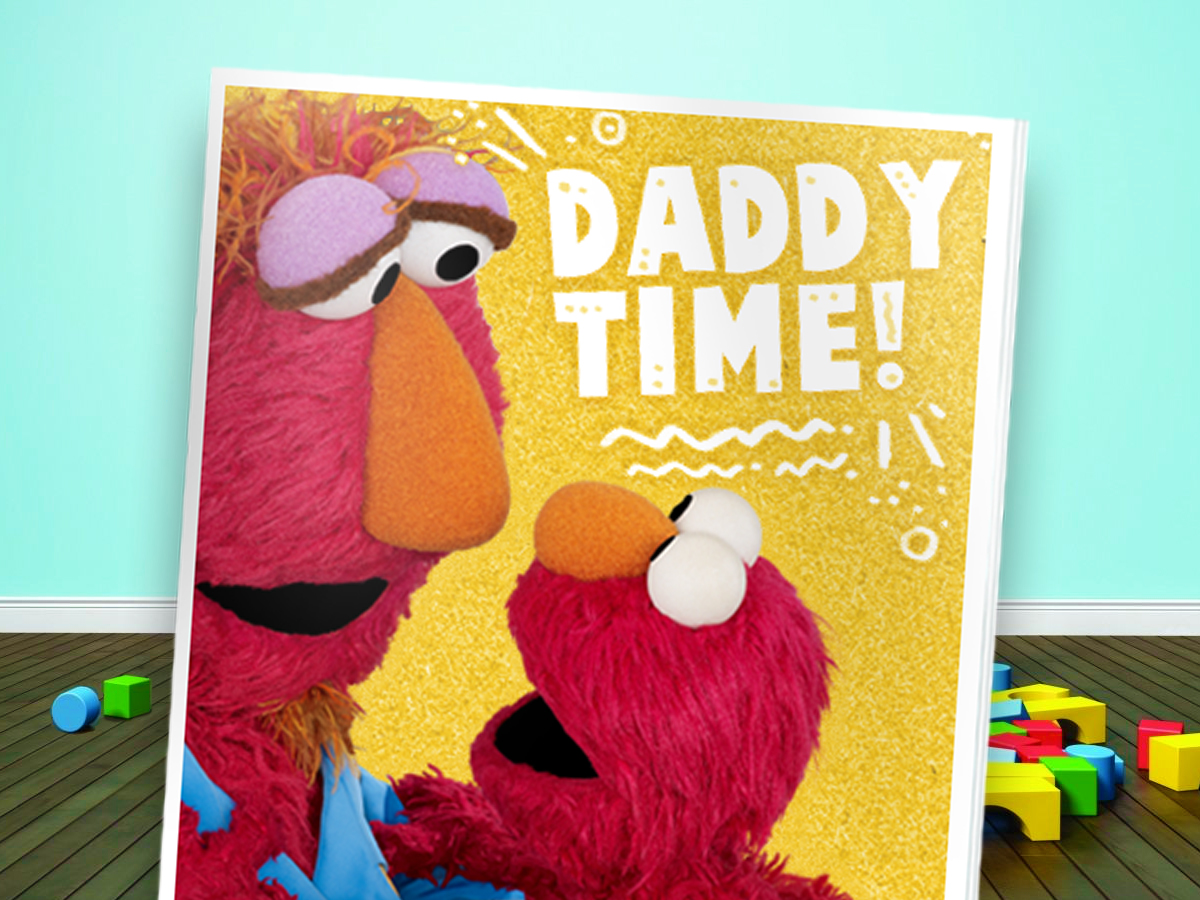 A book with Elmo and Louie on the cover.