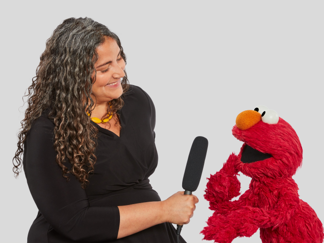 Dr. Laurie Santos and Elmo